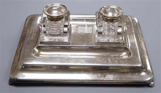 A large George silver desk stand fitted two ink bottles, London 1927, Mappin & Webb, stand 25.5 oz.